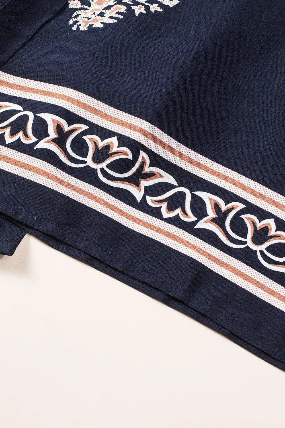 Printed V-Neck Sleeveless Jumpsuit Trendsi