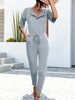 Buttoned Half Sleeve Round Neck Jumpsuit Trendsi