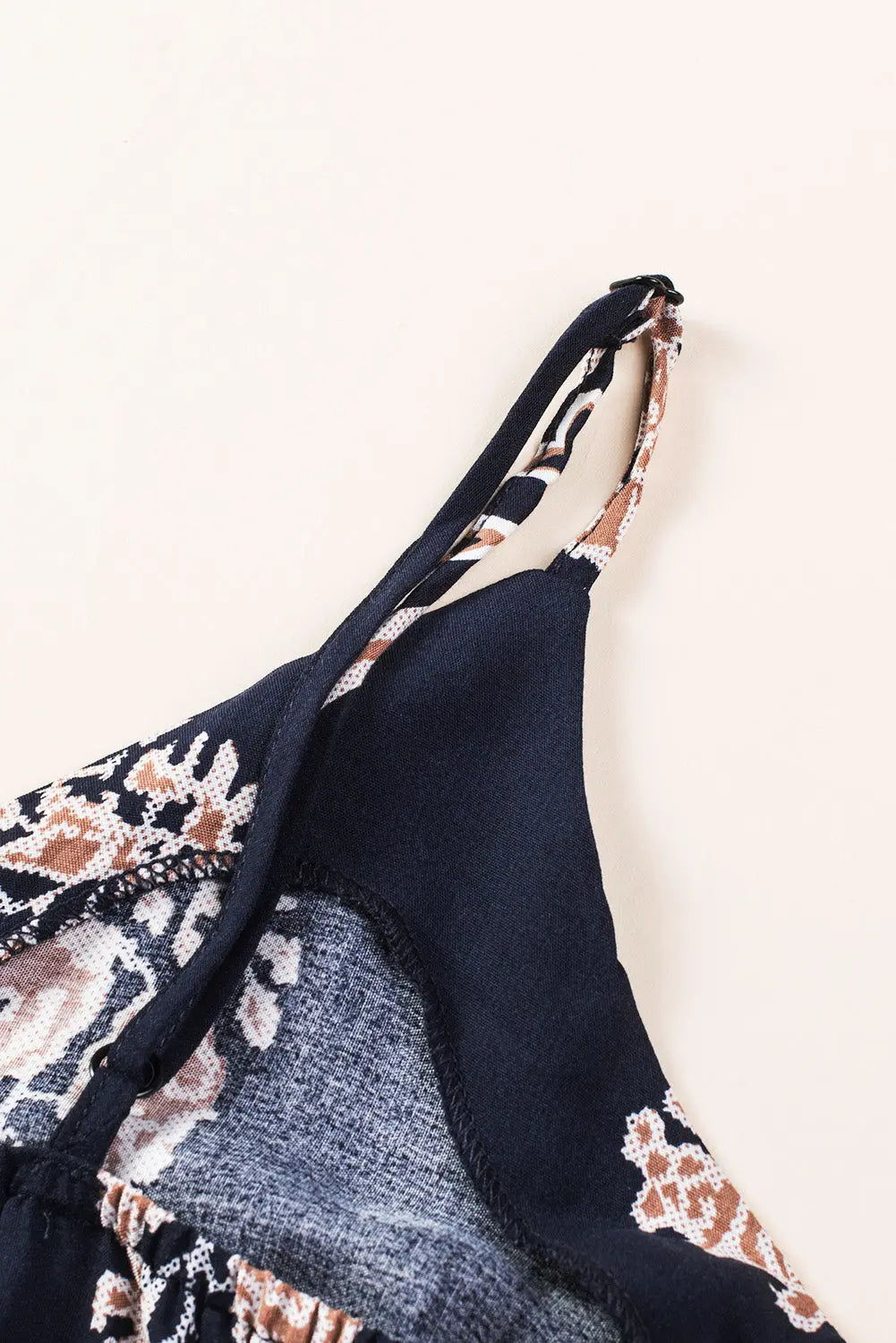 Printed V-Neck Sleeveless Jumpsuit Trendsi