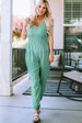 Spaghetti Strap V-Neck Jumpsuit with Pockets Trendsi
