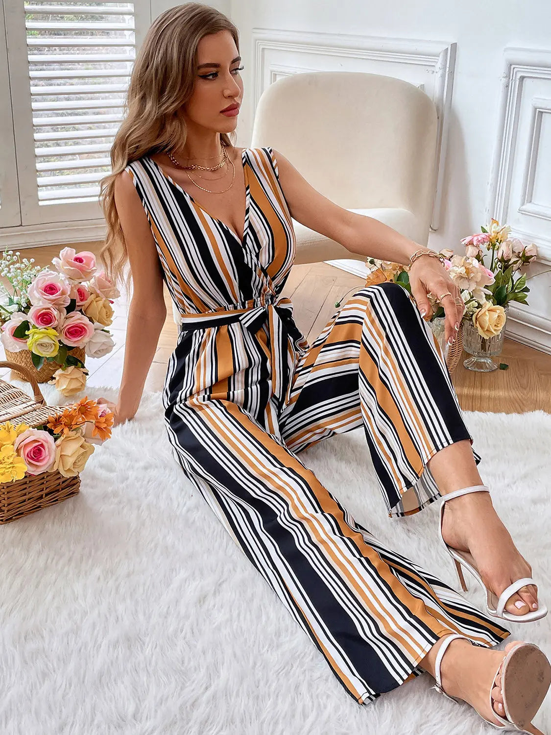 Striped Surplice Neck Sleeveless Wide Leg Jumpsuit Trendsi