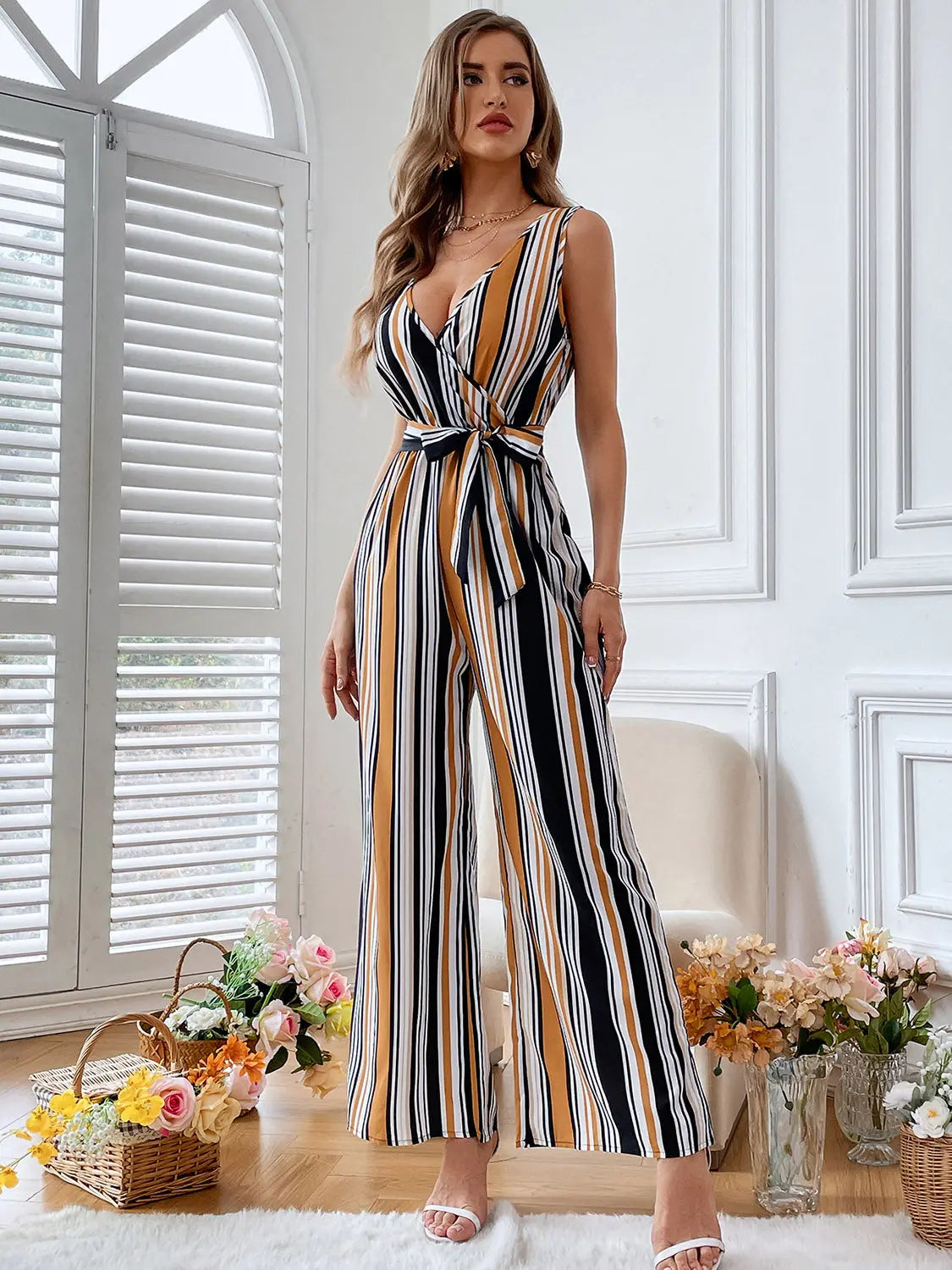 Striped Surplice Neck Sleeveless Wide Leg Jumpsuit Trendsi