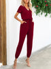 Short Sleeve V-Neck Jumpsuit with Pockets Trendsi