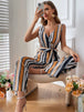 Striped Surplice Neck Sleeveless Wide Leg Jumpsuit Trendsi