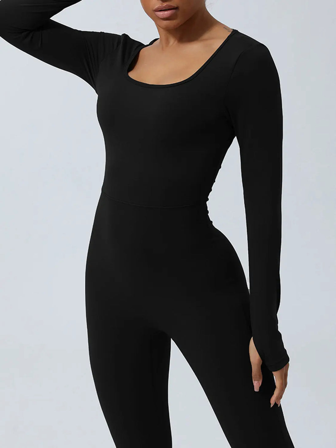 Twisted Backless Long Sleeve Jumpsuit Trendsi