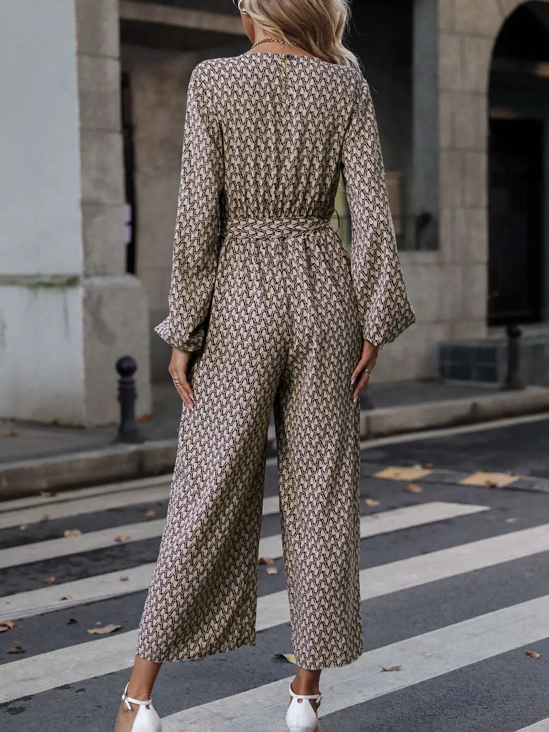 Printed Surplice Neck Tie Waist Wide Leg Jumpsuit Trendsi