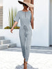 Buttoned Half Sleeve Round Neck Jumpsuit Trendsi