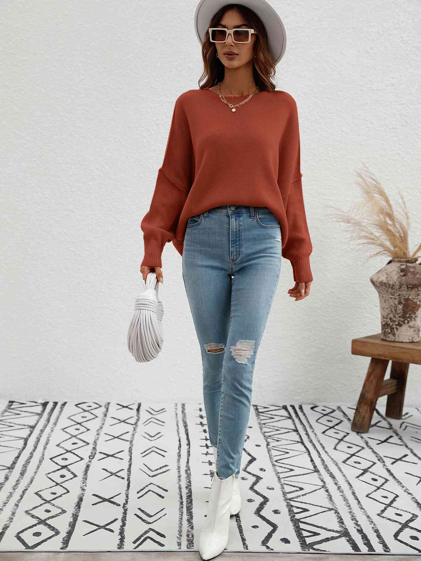 Exposed Seam Dropped Shoulder Slit Sweater Trendsi