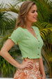 Buttoned Frill Hem Cropped Knit Top Trendsi