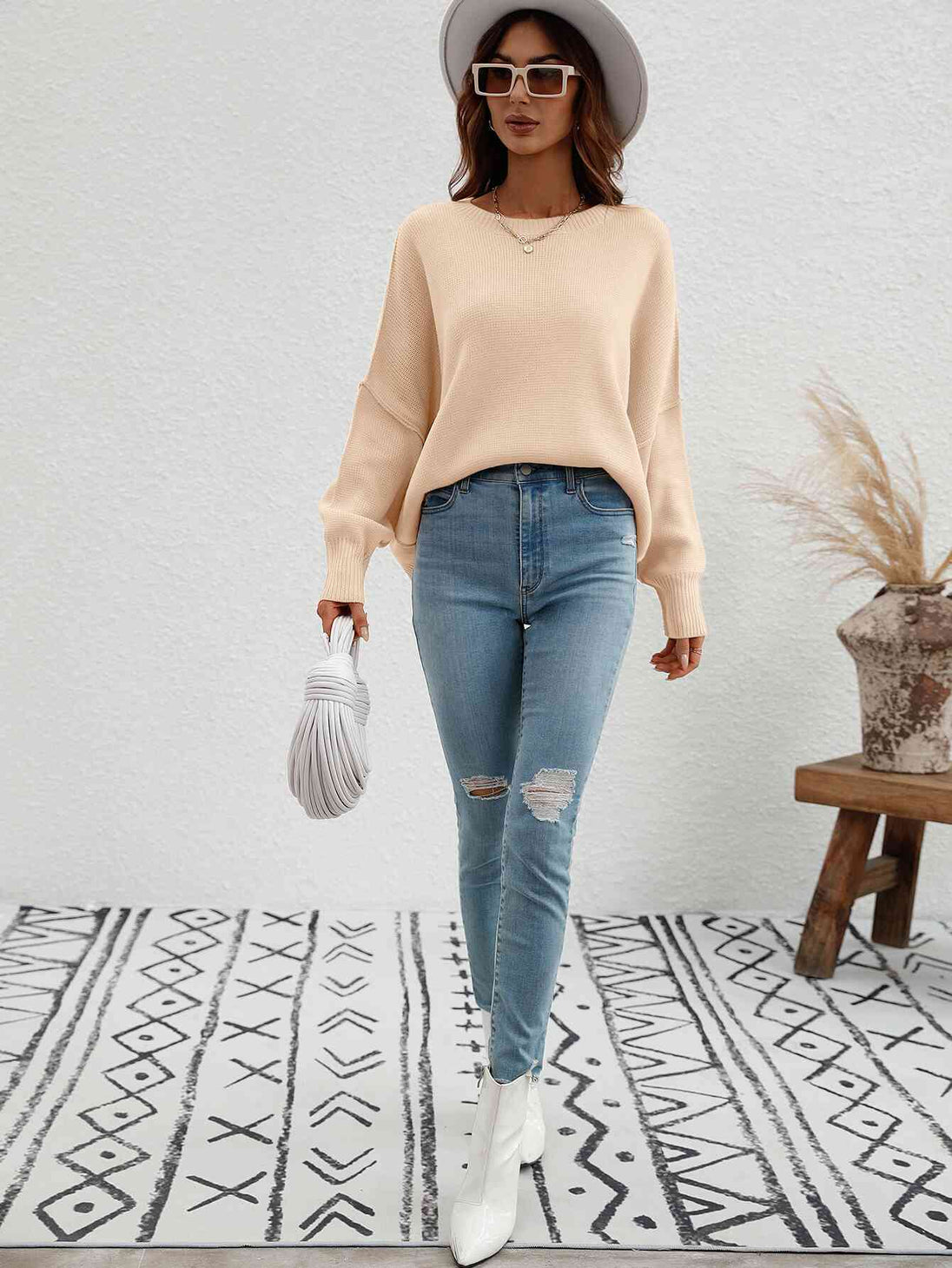 Exposed Seam Dropped Shoulder Slit Sweater Trendsi