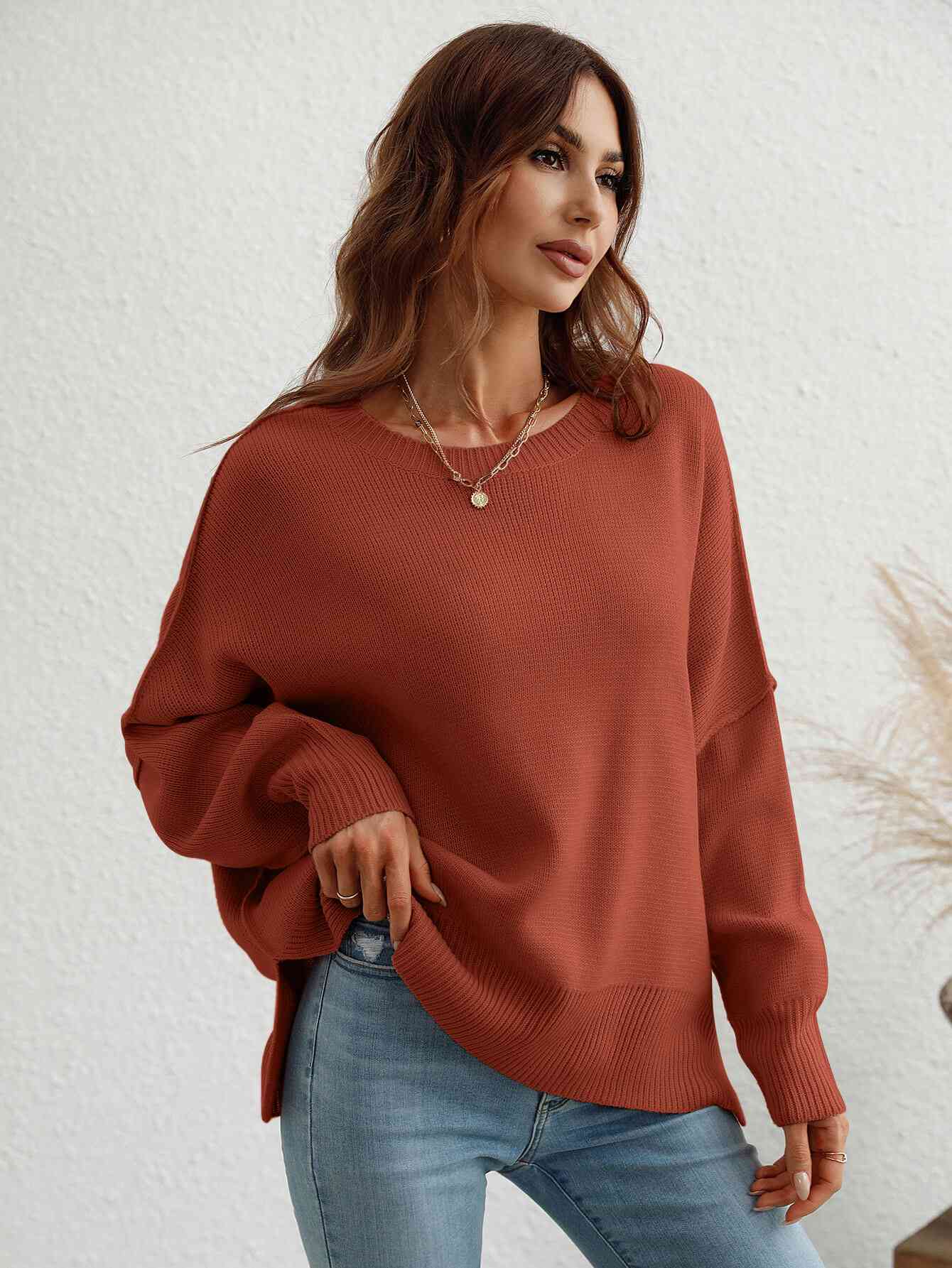 Exposed Seam Dropped Shoulder Slit Sweater Trendsi