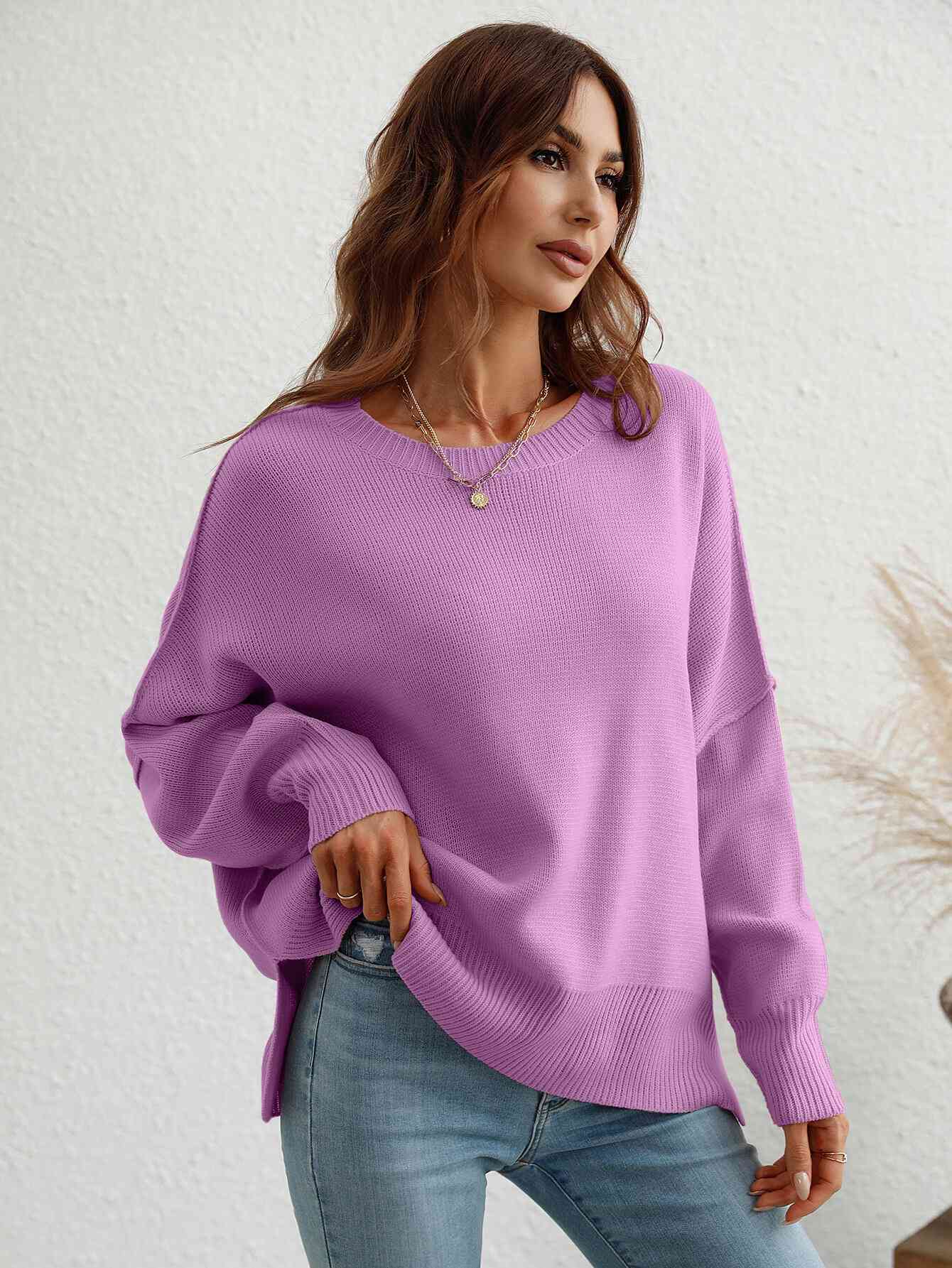 Exposed Seam Dropped Shoulder Slit Sweater Trendsi