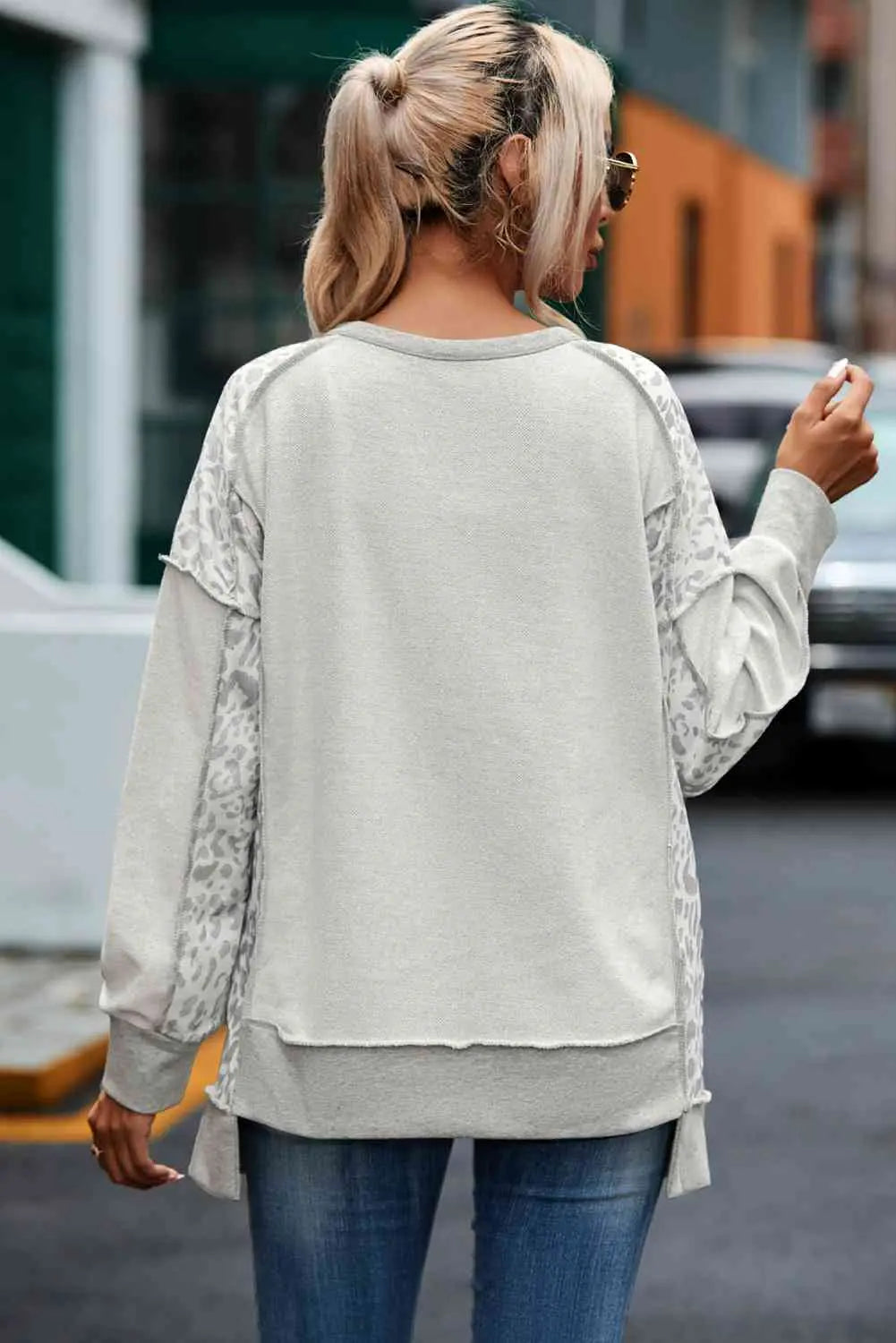 Leopard Exposed Seam Buttoned Round Neck Blouse Trendsi
