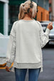 Leopard Exposed Seam Buttoned Round Neck Blouse Trendsi