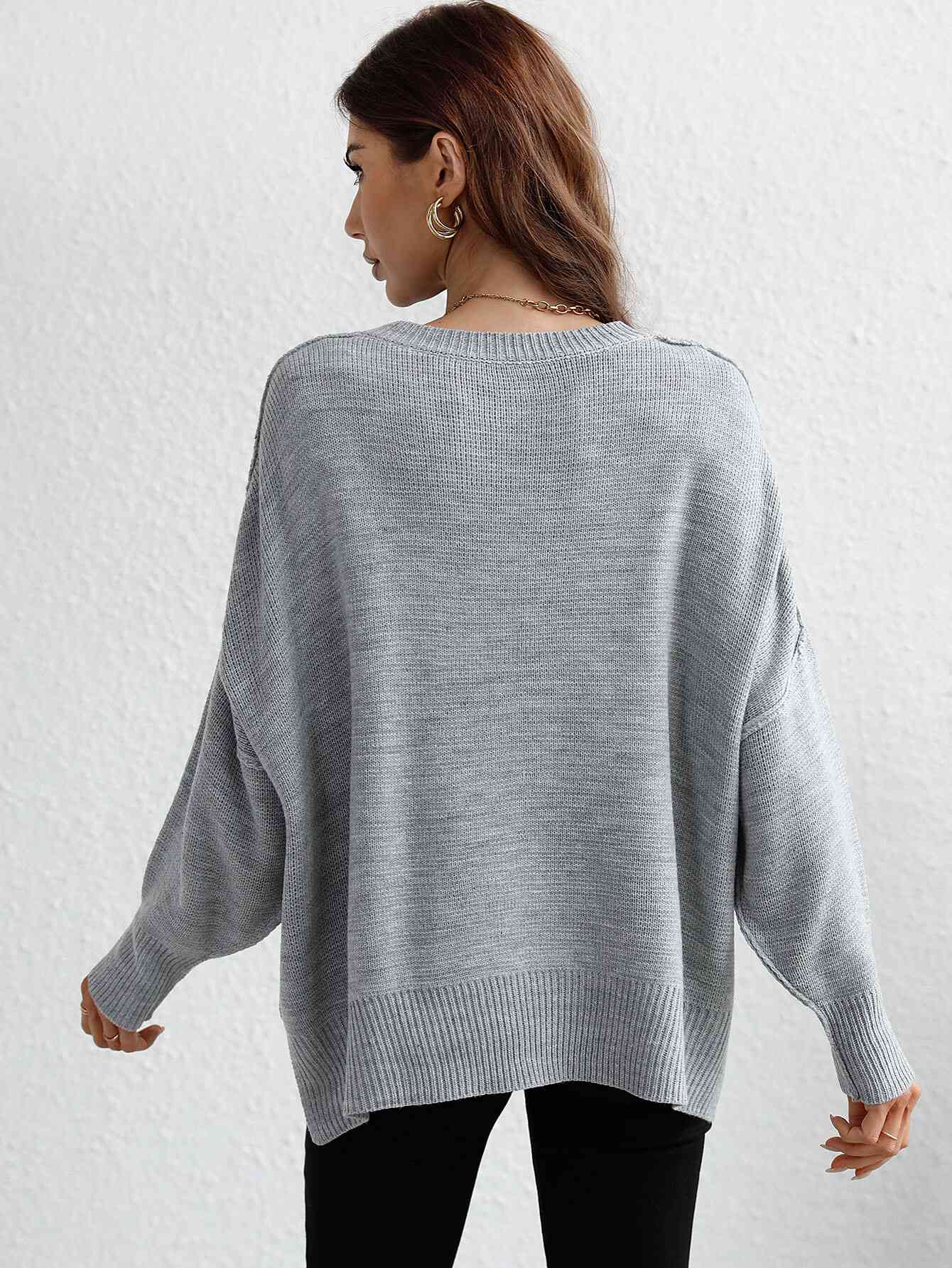 Exposed Seam Dropped Shoulder Slit Sweater Trendsi