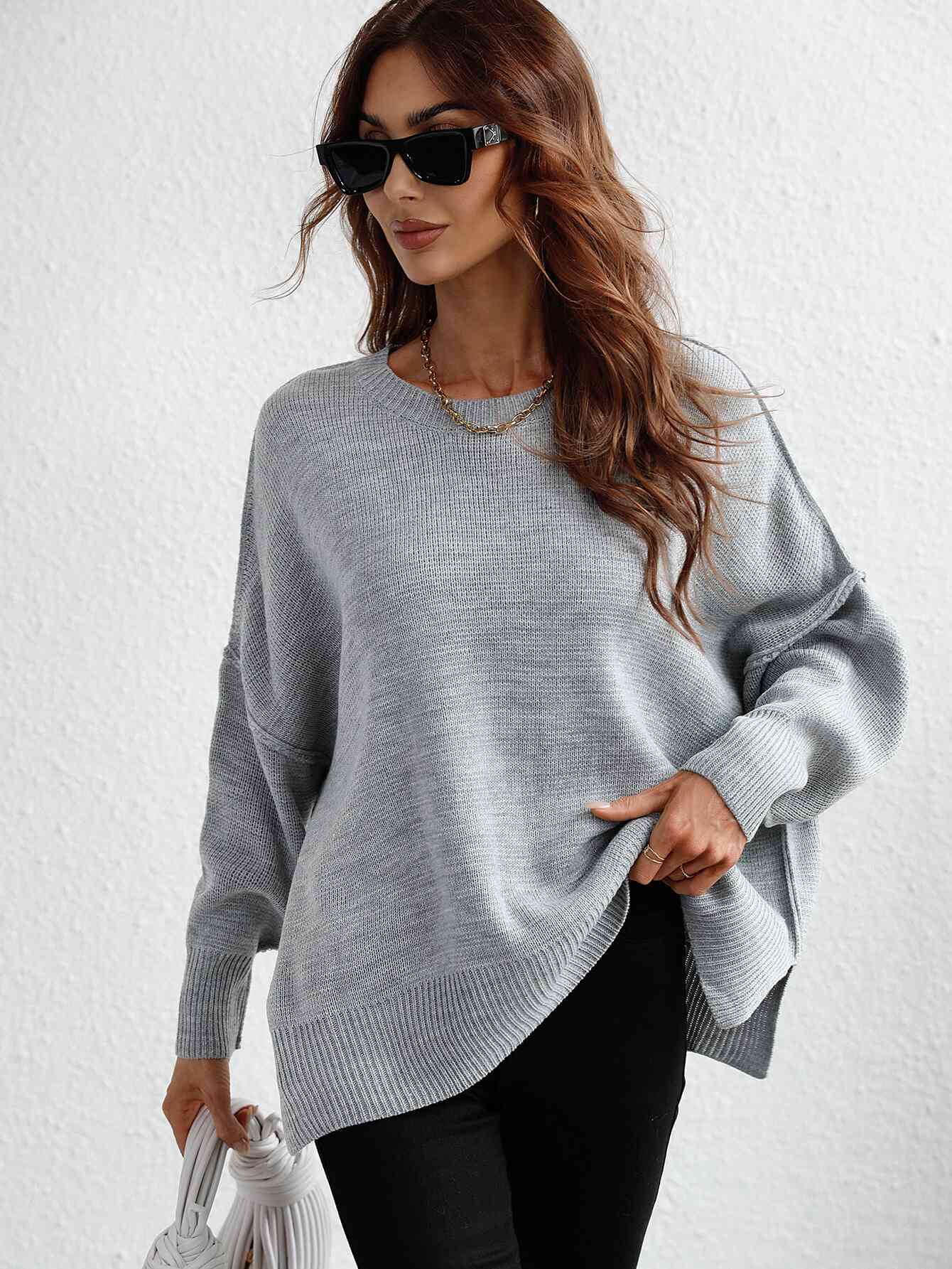 Exposed Seam Dropped Shoulder Slit Sweater Trendsi