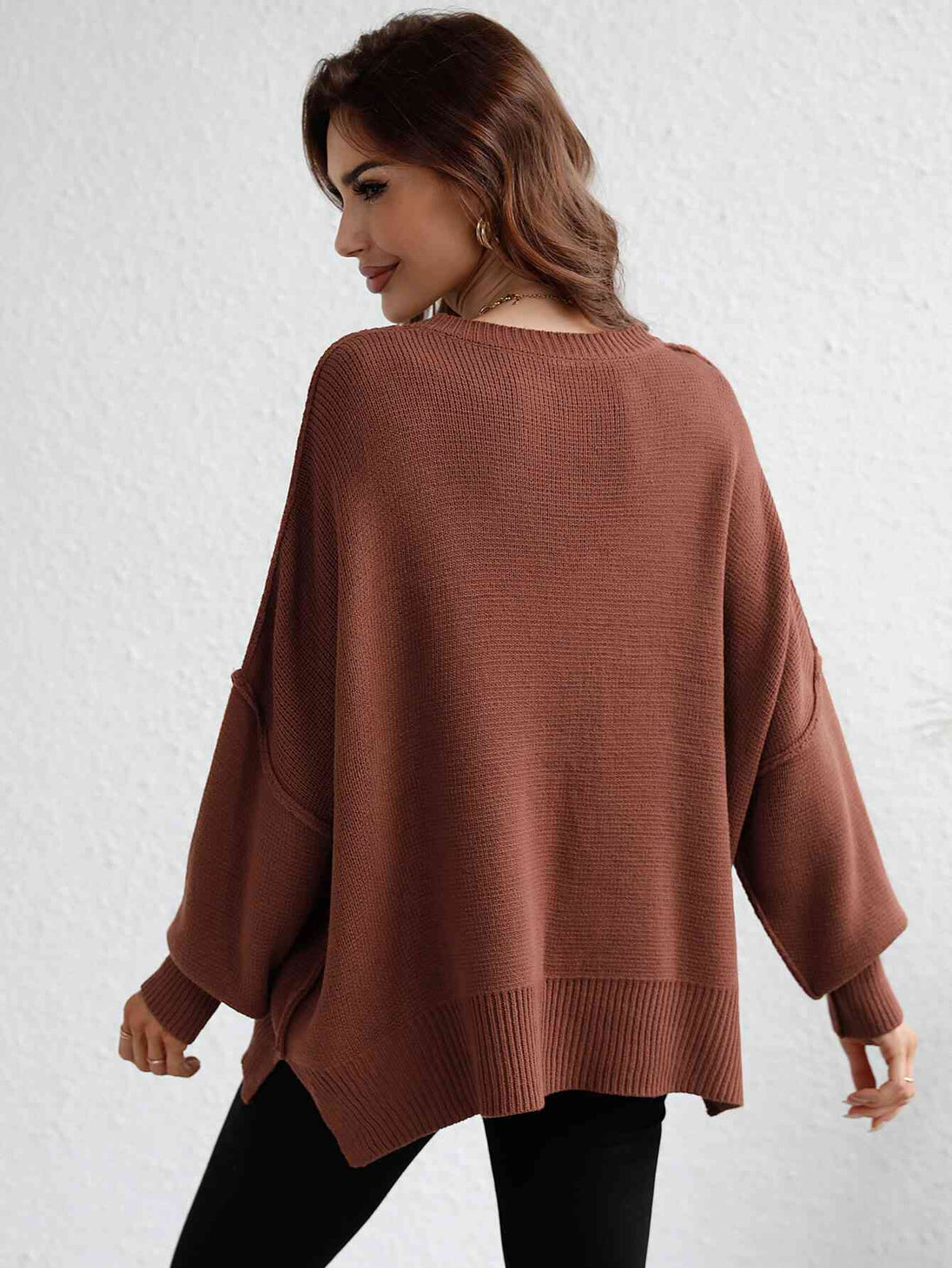 Exposed Seam Dropped Shoulder Slit Sweater Trendsi