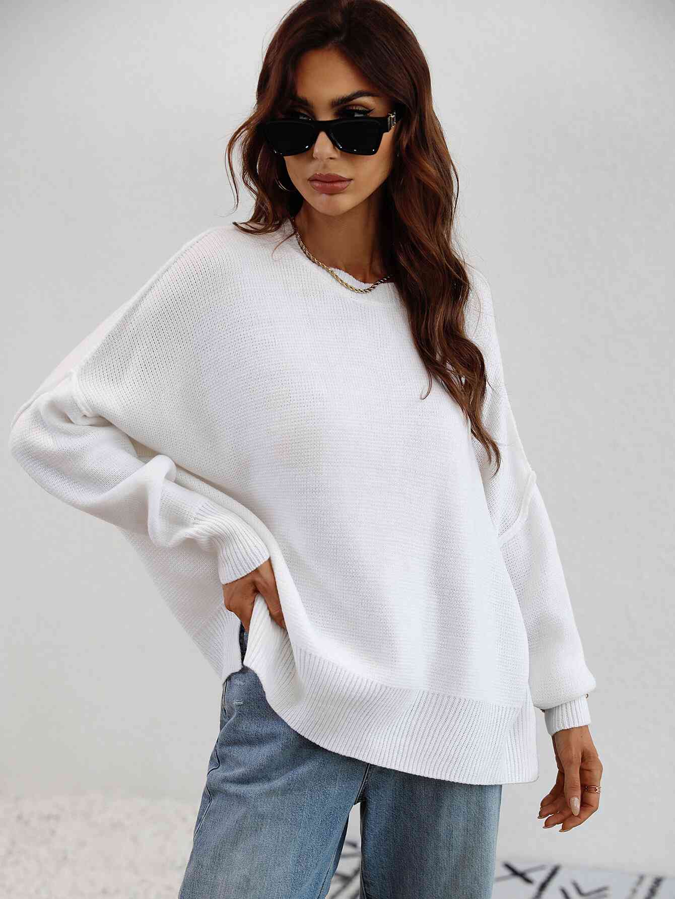 Exposed Seam Dropped Shoulder Slit Sweater Trendsi