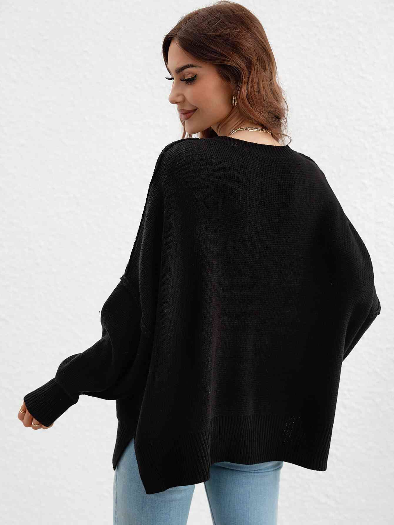 Exposed Seam Dropped Shoulder Slit Sweater Trendsi
